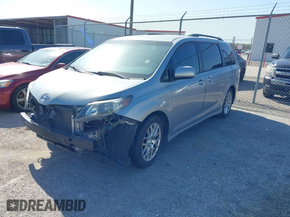 2011 Toyota Sienna SE with VIN 5TDXK3DC8BS131434, listed as a IAAI auction lot 42002675 with 209,396 mi miles. Bid and sale history available at carsss.com. Image 18.