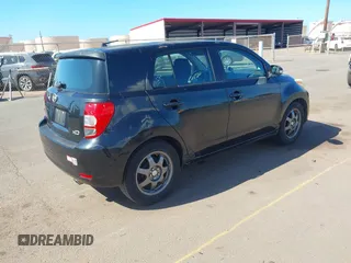 2008 Scion xD with VIN JTKKU10498J006447, listed as a IAAI auction lot 41883311 with 116,444 mi miles. Bid and sale history available at carsss.com. Image 4.