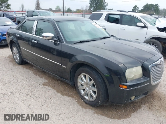 2010 Chrysler 300 Touring with VIN 2C3CA5CV0AH329717, listed as a IAAI auction lot 41785694 with 257,072 mi miles. Bid and sale history available at carsss.com. Image 1.