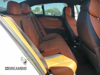 2020 BMW M5 z VIN WBSJF0C09LCE53241, wystawiony jako Copart lot #52607075 z przebiegiem Nie podano mil oraz Szkoda całkowita • Salvage title. Historia ofert i sprzedaży dostępna na DreamBid. Obrazek 10.