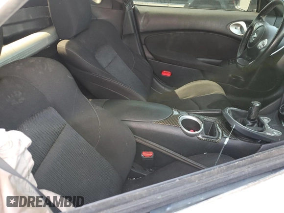 2016 Nissan 370Z z VIN JN1AZ4EH9GM933658, wystawiony jako Copart lot #48760215 z przebiegiem 70 682 mil mil oraz Szkoda całkowita • Salvage title. Historia ofert i sprzedaży dostępna na DreamBid. Obrazek 10.