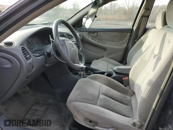 2001 Oldsmobile Alero GL2 with VIN 1G3NL52E51C182619, listed as a Copart auction lot 51489945 with 123,734 mi miles and Salvage Title. Bid and sale history available at DreamBid. Image 7.