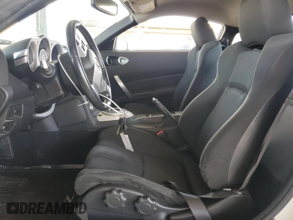 2006 Nissan 350Z Touring z VIN JN1AZ34D66M330951, wystawiony jako Copart lot #52898615 z przebiegiem 68 888 mil mil oraz Nie do naprawy • Non repairable. Historia ofert i sprzedaży dostępna na DreamBid. Obrazek 7.