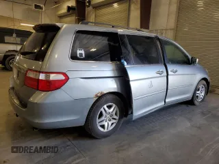 2007 Honda Odyssey EX с VIN 5FNRL38457B132819, выставлен на аукционе Copart как лот 57711625 с пробегом 265 463 миль миль и Списание • Salvage title. История ставок и продаж доступна на DreamBid. Изображение 3.