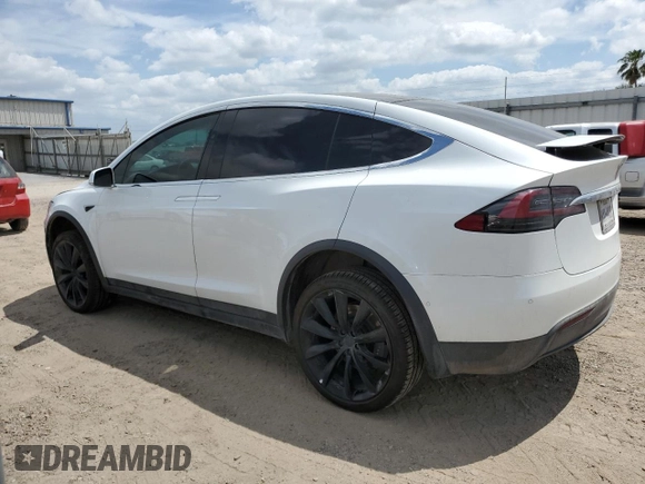 2020 Tesla Model X Long Range with VIN 5YJXCDE20LF303678, listed as a Copart auction lot 53026705 with Not Provided miles and Salvage Title. Bid and sale history available at carsss.com. Image 2.