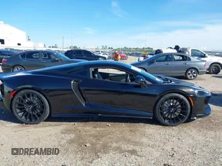 2020 McLaren GT with VIN SBM22GCA1LW000498, listed as a IAAI auction lot 41265247 with 18,465 mi miles. Bid and sale history available at carsss.com. Image 14.