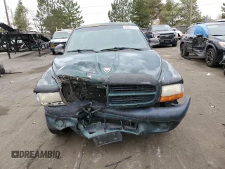1999 Dodge Dakota SLT with VIN 1B7FL26X8XS161292, listed as a Copart auction lot 83675504 with 108,515 mi miles and Salvage Title. Bid and sale history available at carsss.com. Image 5.