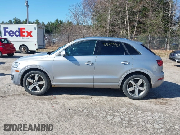 2015 Audi Q3 2.0T Premium Plus with VIN WA1EFCFSXFR010015, listed as a IAAI auction lot 42099410 with 142,117 mi miles. Bid and sale history available at carsss.com. Image 14.