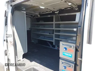 2023 Ford Transit Cargo z VIN 1FTYE1Y81PKB53926, wystawiony jako IAAI lot #42514906 z przebiegiem 52 410 mil mil oraz . Historia ofert i sprzedaży dostępna na DreamBid. Obrazek 8.