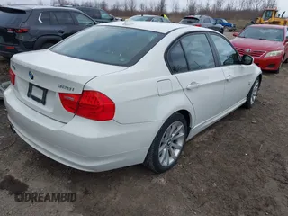 2011 BMW 3 Series 328i xDrive with VIN WBAPK5C55BF122623, listed as a IAAI auction lot 41868600 with 105,948 mi miles. Bid and sale history available at carsss.com. Image 3.