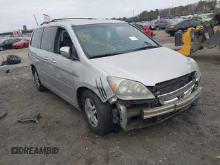 2005 Honda Odyssey EX with VIN 5FNRL38435B071998, listed as a IAAI auction lot 41808601 with 999,999 mi miles. Bid and sale history available at carsss.com. Image 1.