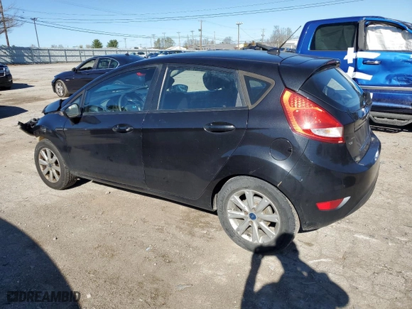 2013 Ford Fiesta SE with VIN 3FADP4EJXDM202150, listed as a Copart auction lot 79851174 with 127,979 mi miles and Salvage Title. Bid and sale history available at carsss.com. Image 2.