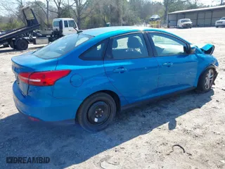 2015 Ford Focus SE with VIN 1FADP3F25FL200831, listed as a IAAI auction lot 41785206 with 141,139 mi miles. Bid and sale history available at carsss.com. Image 4.