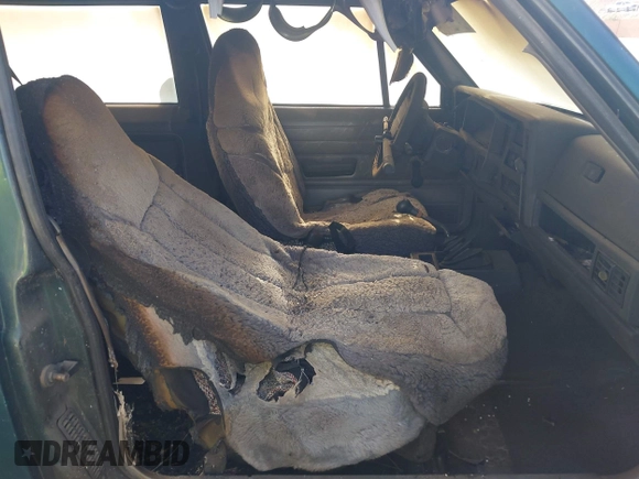 1996 Jeep Cherokee SE with VIN 1J4FT27P4TL309029, listed as a IAAI auction lot 42476830 with Not provided miles and . Bid and sale history available at DreamBid. Image 5.