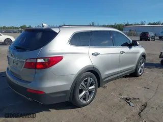 2014 Hyundai Santa Fe Limited with VIN KM8SR4HF0EU072293, listed as a IAAI auction lot 41565281 with 129,727 mi miles. Bid and sale history available at carsss.com. Image 4.