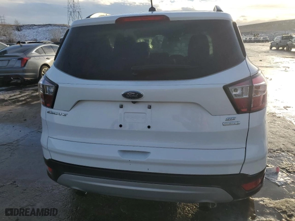 2018 Ford Escape SE with VIN 1FMCU0GDXJUD48551, listed as a Copart auction lot 42595875 with 39,456 mi miles and Salvage Title. Bid and sale history available at carsss.com. Image 6.