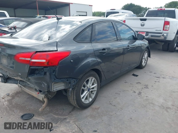 2018 Ford Focus SE with VIN 1FADP3F22JL295342, listed as a IAAI auction lot 42335881 with 77,464 mi miles and . Bid and sale history available at DreamBid. Image 4.