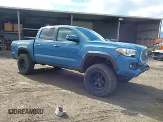 2019 Toyota Tacoma SR with VIN 3TMCZ5AN4KM219960, listed as a IAAI auction lot 41347378 with 52,788 mi miles and . Bid and sale history available at DreamBid. Image 1.