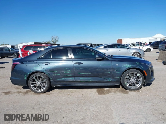 2020 Cadillac CT4 Sport z VIN 1G6DG5RK7L0126572, wystawiony jako IAAI lot #41228588 z przebiegiem 77 429 mil mil oraz . Historia ofert i sprzedaży dostępna na DreamBid. Obrazek 13.