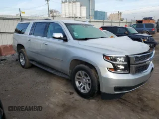 2018 Chevrolet Suburban LT with VIN 1GNSCHKCXJR332103, listed as a Copart auction lot 82861393 with 143,607 mi miles and . Bid and sale history available at DreamBid. Image 4.
