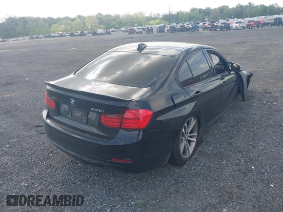 2013 BMW 3 Series 335i xDrive with VIN WBA3B9G54DNR89987, listed as a IAAI auction lot 42159592 with 165,999 mi miles and . Bid and sale history available at DreamBid. Image 4.