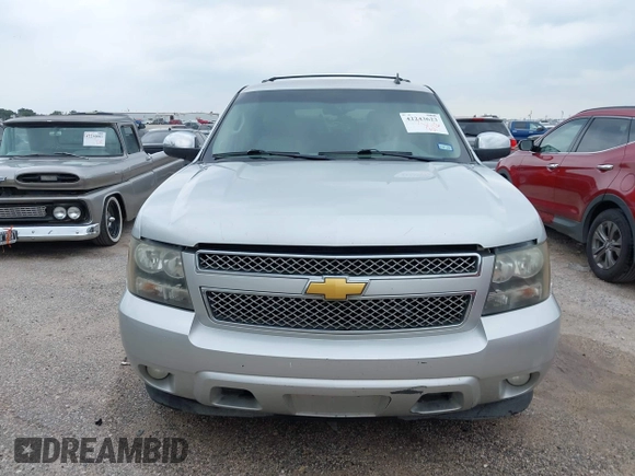 2011 Chevrolet Tahoe LT with VIN 1GNSCBE05BR190310, listed as a IAAI auction lot 42243623 with 249,453 mi miles and . Bid and sale history available at DreamBid. Image 12.