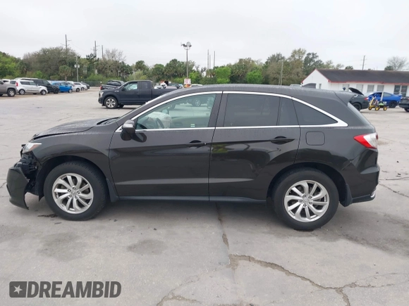 2017 Acura RDX with VIN 5J8TB3H35HL018433, listed as a IAAI auction lot 41628778 with 216,627 mi miles. Bid and sale history available at carsss.com. Image 14.