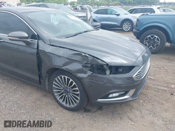 2017 Ford Fusion SE with VIN 3FA6P0T9XHR186017, listed as a IAAI auction lot 42535725 with 166,794 mi miles and . Bid and sale history available at DreamBid. Image 6.