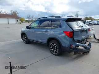2023 Honda Passport Elite with VIN 5FNYF8H03PB000039, listed as a IAAI auction lot 40593339 with 33,697 mi miles and . Bid and sale history available at DreamBid. Image 3.