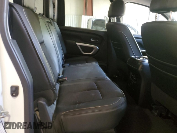 2017 Nissan Titan SV z VIN 1N6AA1E57HN569872, wystawiony jako Copart lot #53254555 z przebiegiem 170 573 mil mil oraz Szkoda całkowita • Salvage title. Historia ofert i sprzedaży dostępna na DreamBid. Obrazek 10.