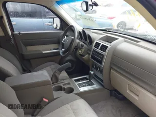 2007 Dodge Nitro SLT with VIN 1D8GT58K77W640112, listed as a IAAI auction lot 42015613 with 220,061 mi miles. Bid and sale history available at carsss.com. Image 5.