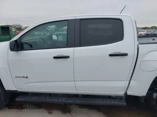 2021 GMC Canyon 4WD AT4 w/Leather with VIN 1GTG6FEN6M1154040, listed as a IAAI auction lot 41209527 with 29,484 mi miles. Bid and sale history available at carsss.com. Image 14.