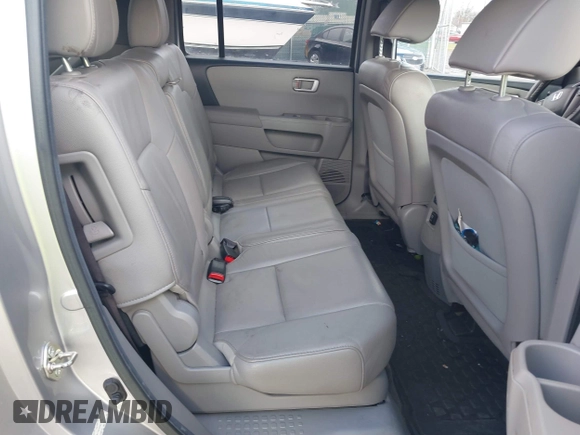 2013 Honda Pilot EX-L with VIN 5FNYF3H76DB013332, listed as a IAAI auction lot 41193240 with 121,308 mi miles and . Bid and sale history available at DreamBid. Image 8.
