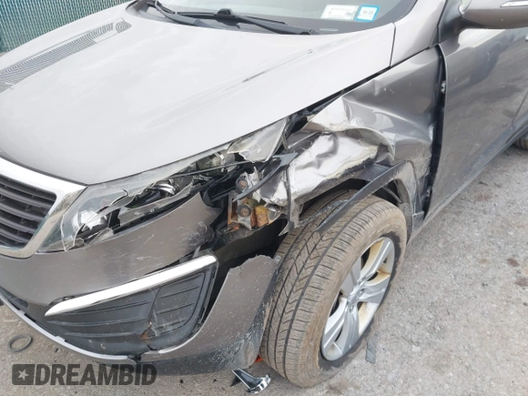 2012 Kia Sportage LX with VIN KNDPB3A28C7332354, listed as a IAAI auction lot 41933058 with 75,938 mi miles. Bid and sale history available at carsss.com. Image 6.
