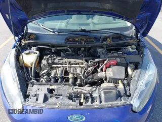 2014 Ford Fiesta SE with VIN 3FADP4BJ5EM190009, listed as a IAAI auction lot 42036976 with 157,575 mi miles. Bid and sale history available at carsss.com. Image 10.