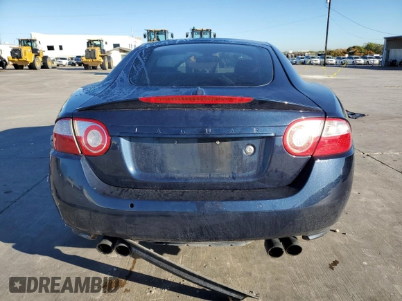 2008 Jaguar XK with VIN SAJWA43C589B23096, listed as a Copart auction lot 79337334 with 143,902 mi miles and Salvage Title. Bid and sale history available at carsss.com. Image 6.