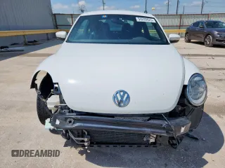 2019 Volkswagen Beetle S с VIN 3VWFD7AT0KM714028, выставлен на аукционе Copart как лот 59209825 с пробегом 180 489 миль миль и Списание • Salvage title. История ставок и продаж доступна на DreamBid. Изображение 5.