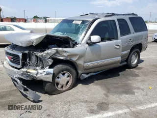2003 GMC Yukon SLT z VIN 1GKEC13T33R310365, wystawiony jako Copart lot #55635875 z przebiegiem 182 643 mil mil oraz Szkoda całkowita • Salvage title. Historia ofert i sprzedaży dostępna na DreamBid. Obrazek 1.