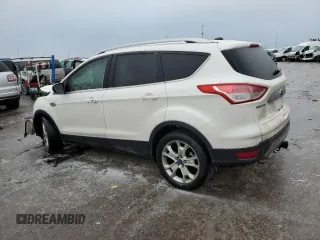 2014 Ford Escape Titanium с VIN 1FMCU0J97EUD44340, выставлен на аукционе Copart как лот 43975895 с пробегом 176 665 миль миль и Списание • Salvage title. История ставок и продаж доступна на DreamBid. Изображение 1.