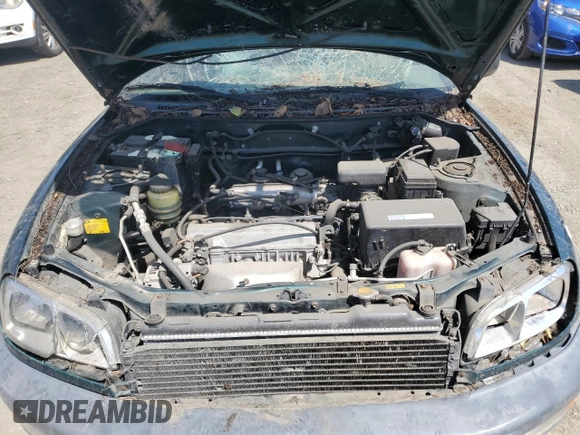1999 Toyota RAV4 with VIN JT3GP10V9X7044726, listed as a Copart auction lot 55180935 with 196,509 mi miles and Salvage Title. Bid and sale history available at DreamBid. Image 12.