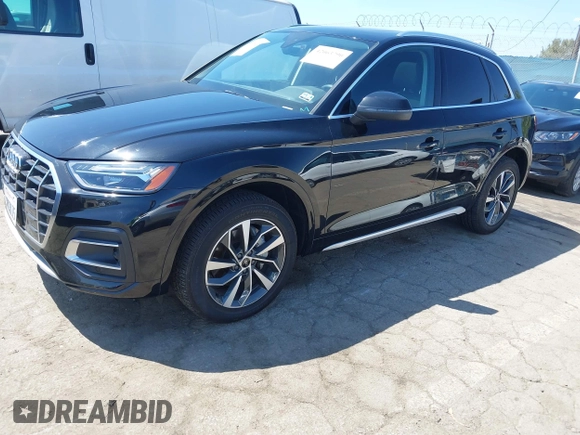 2021 Audi Q5 Premium Plus z VIN WA1BAAFY7M2114476, wystawiony jako IAAI lot #42063790 z przebiegiem 44 945 mil mil oraz . Historia ofert i sprzedaży dostępna na DreamBid. Obrazek 18.
