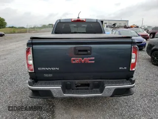 2015 GMC Canyon 2WD SLE with VIN 1GTH5BEA7F1158758, listed as a Copart auction lot 63617524 with 102,744 mi miles and Salvage Title. Bid and sale history available at carsss.com. Image 6.