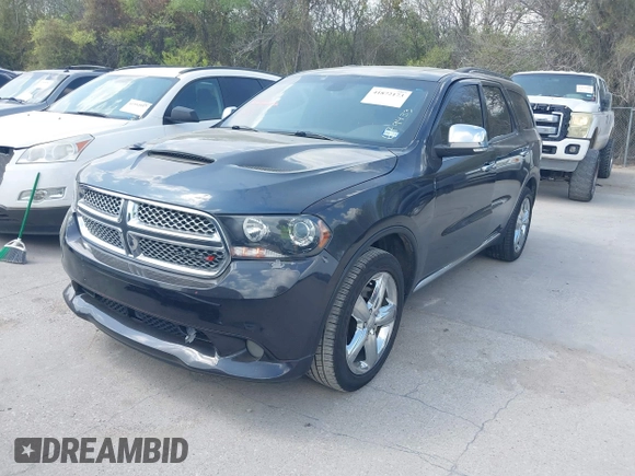 2013 Dodge Durango Citadel with VIN 1C4SDHET0DC679433, listed as a IAAI auction lot 41872173 with 223,929 mi miles and . Bid and sale history available at carsss.com. Image 2.
