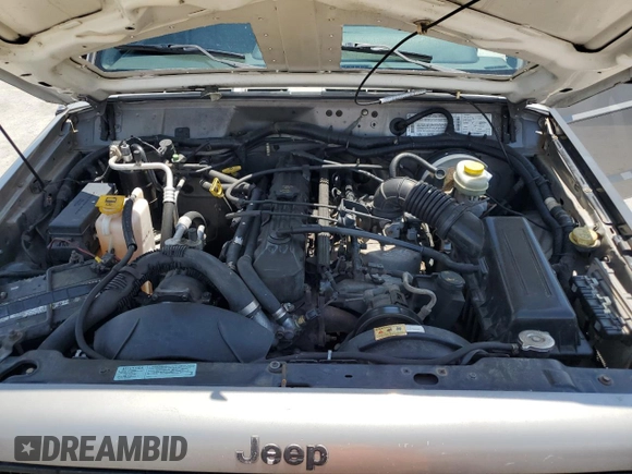 2000 Jeep Cherokee SE with VIN 1J4FF28SXYL140930, listed as a Copart auction lot 59191035 with 248,598 mi miles and Salvage title. Bid and sale history available at DreamBid. Image 12.