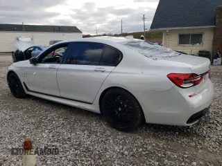 2017 BMW 7 Series 740e xDrive iPerformance with VIN WBA7J2C36HG497830, listed as a Copart auction lot 79948304 with 43,029 mi miles and Salvage Title. Bid and sale history available at carsss.com. Image 2.
