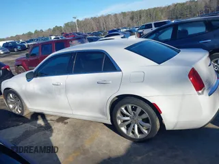 2016 Chrysler 300 Anniversary Edition with VIN 2C3CCAAG6GH343881, listed as a IAAI auction lot 41593752 with 135,719 mi miles and . Bid and sale history available at DreamBid. Image 14.