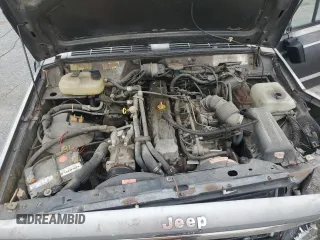1987 Jeep Cherokee z VIN 1JCMR7819HT151523, wystawiony jako Copart lot #51586765 z przebiegiem 113 668 mil mil oraz Szkoda całkowita • Salvage title. Historia ofert i sprzedaży dostępna na DreamBid. Obrazek 11.