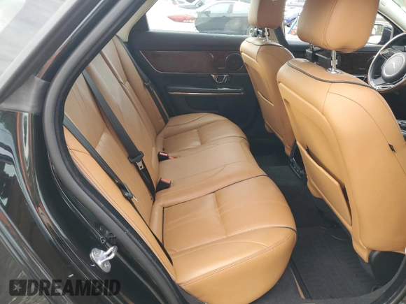 2019 Jaguar XJ R-Sport with VIN SAJWJ1CD1K8W18574, listed as a Copart auction lot 65041445 with 101,072 mi miles and Clean title. Bid and sale history available at DreamBid. Image 10.