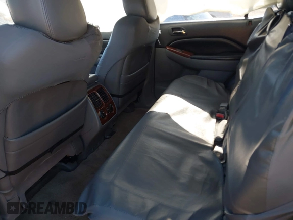 2005 Acura MDX with VIN 2HNYD18205H531571, listed as a IAAI auction lot 41405975 with 127,354 mi miles. Bid and sale history available at carsss.com. Image 8.