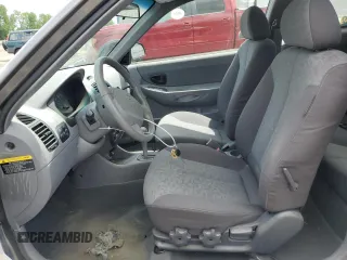 2005 Hyundai Accent GLS with VIN KMHCG35C15U342811, listed as a Copart auction lot 54855705 with 39,299 mi miles and Clean Title. Bid and sale history available at carsss.com. Image 7.